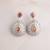 Silver plated apricot orange teardrop earrings