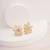 Golden floral bloom stud earrings