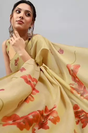 Cream tissue printed saree with blouse