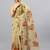 Cream tissue printed saree with blouse
