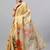 Beige tussar printed saree with blouse