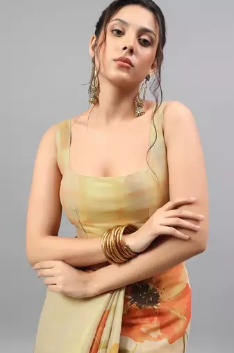 Beige tussar printed saree with blouse