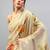 Beige tussar printed saree with blouse