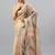 Beige tissue printed saree with blouse
