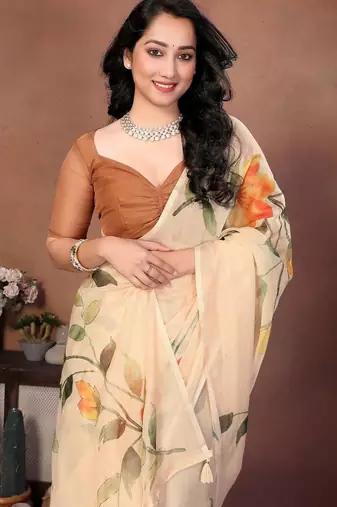 Cream organza printed saree with blouse