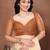 Cream organza printed saree with blouse