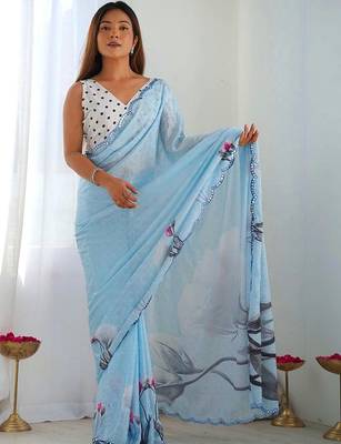Turquoise pure georgette printed saree with blouse 1