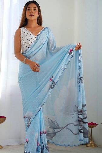 Turquoise pure georgette printed saree with blouse