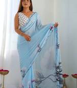 Turquoise pure georgette printed saree with blouse