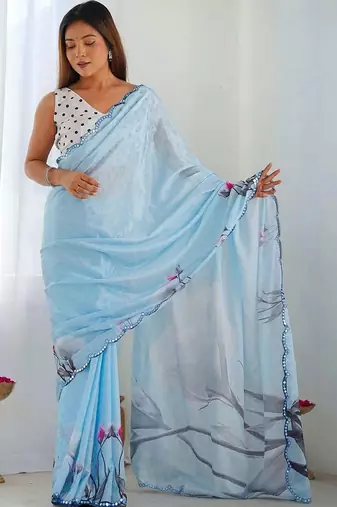 Turquoise pure georgette printed saree with blouse