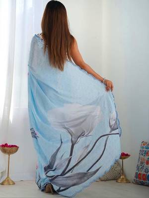 Turquoise pure georgette printed saree with blouse 5