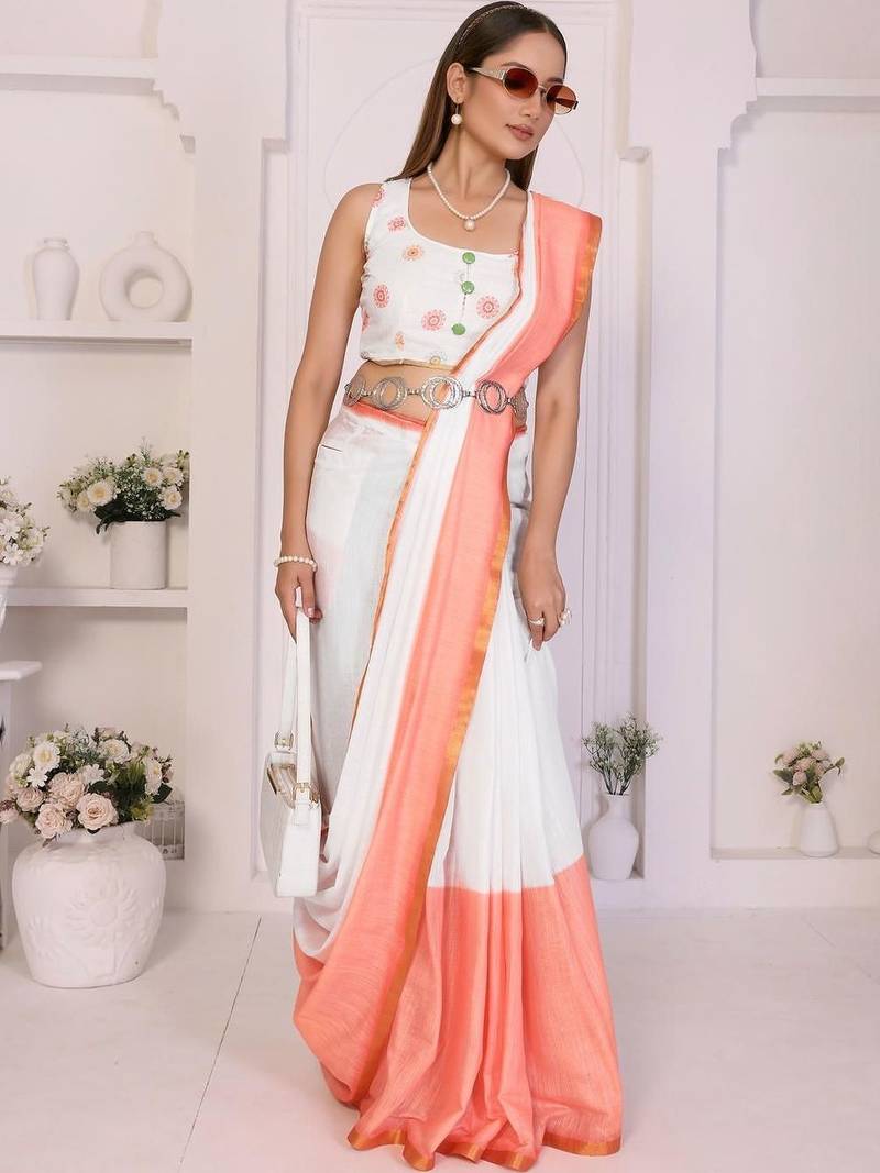 Off white linen solid saree with blouse