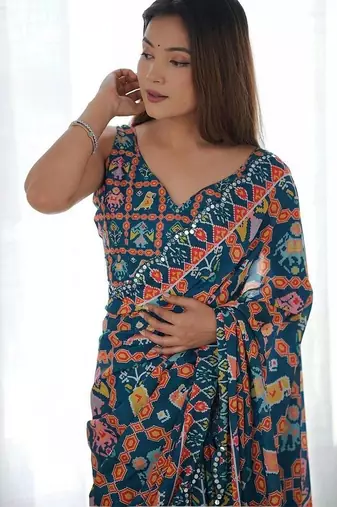 Teal pure georgette printed saree with blouse