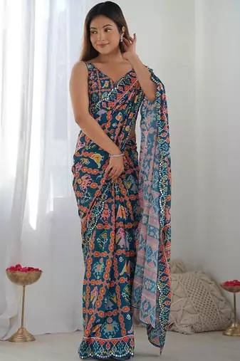 Teal pure georgette printed saree with blouse
