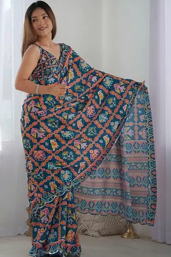 Teal pure georgette printed saree with blouse
