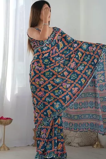 Teal pure georgette printed saree with blouse