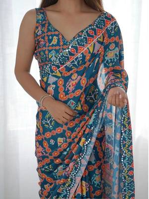 Teal pure georgette printed saree with blouse 5