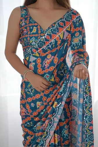 Teal pure georgette printed saree with blouse