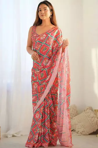 Peach pure georgette printed saree with blouse