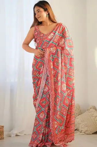 Peach pure georgette printed saree with blouse