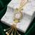 green  color women gold-toned kashmiri pearl & stone-studded ethnic wrist watch