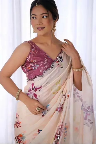 Off white pure georgette printed saree with blouse