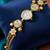 green  color women gold-toned kashmiri pearl & stone-studded ethnic wrist watch