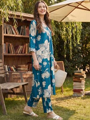 Women Floral Printed Regular Kurta with Trousers 3
