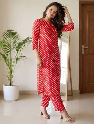 Women Printed Regular Kurta with Trousers 1