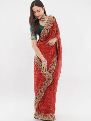 Red georgette embellished saree with blouse 3