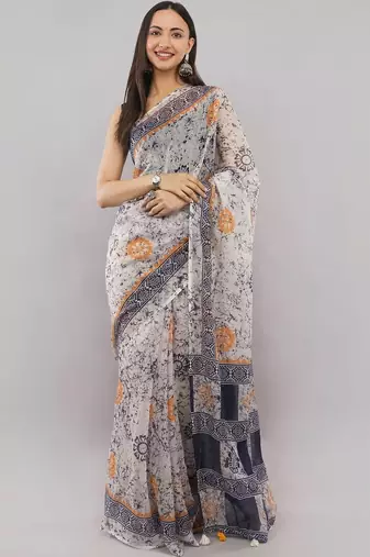 Off white linen printed saree with blouse