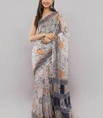 Off white linen printed saree with blouse