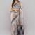 Off white linen printed saree with blouse