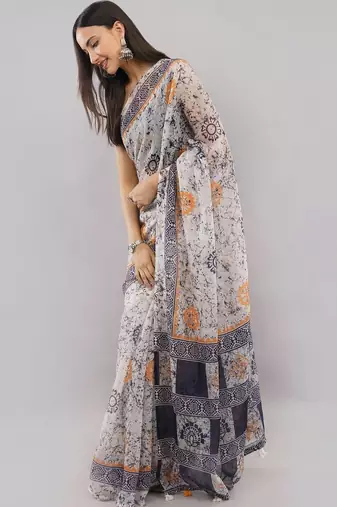 Off white linen printed saree with blouse