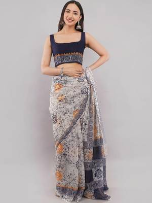 Off white linen printed saree with blouse 5