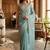 Turquoise linen printed saree with blouse