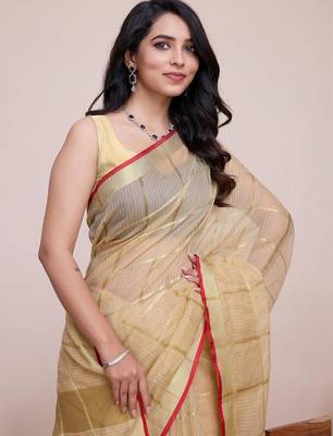 Beige silk blend checked saree with blouse 2