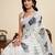 Off white linen printed saree with blouse