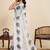 Off white linen printed saree with blouse