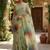 Sea green polyester printed saree with blouse