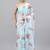 Turquoise organza printed saree with blouse