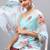 Turquoise organza printed saree with blouse