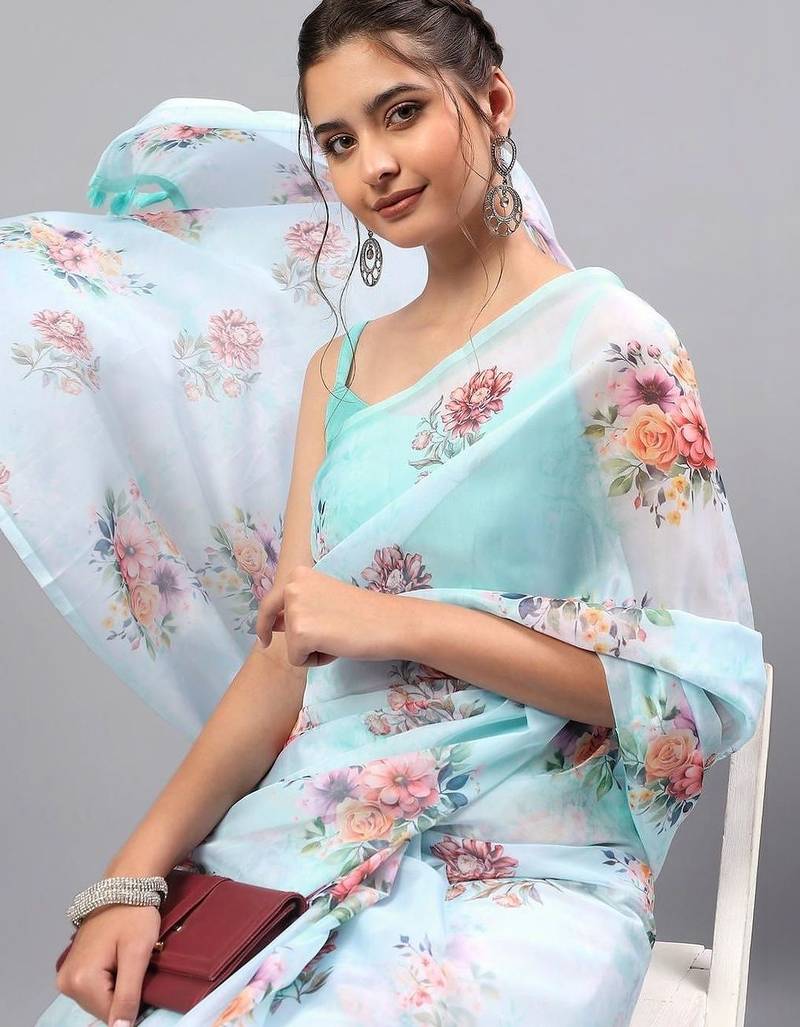 Turquoise organza printed saree with blouse
