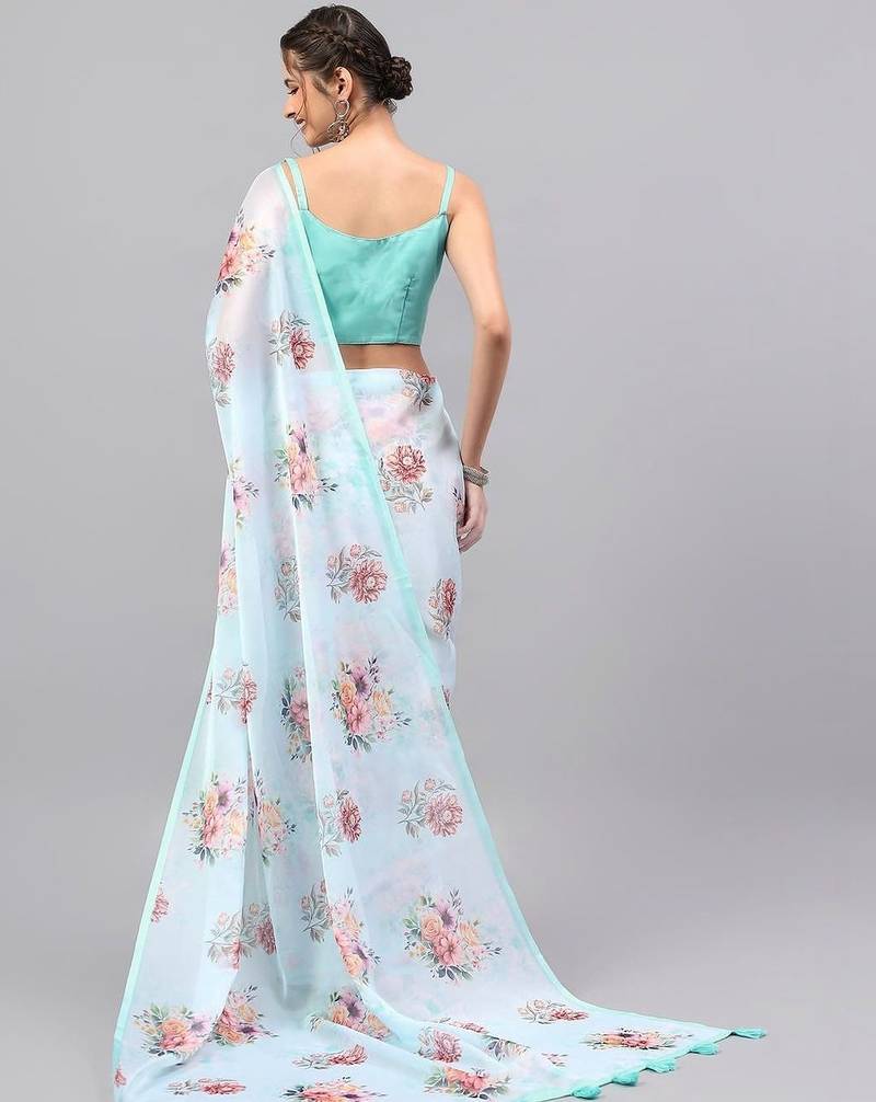 Turquoise organza printed saree with blouse