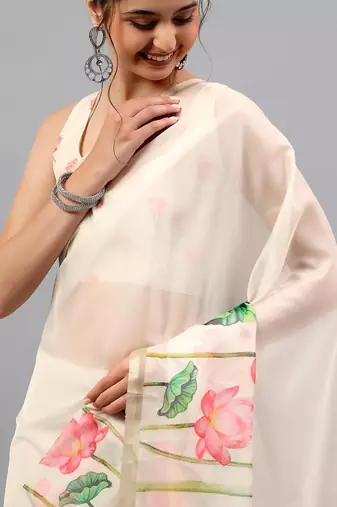 Off white organza printed saree with blouse