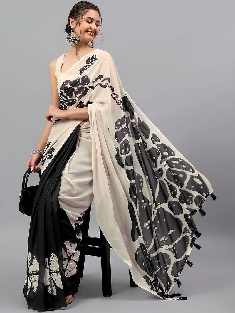 Off white pure georgette printed saree with blouse