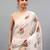Off white organza printed saree with blouse