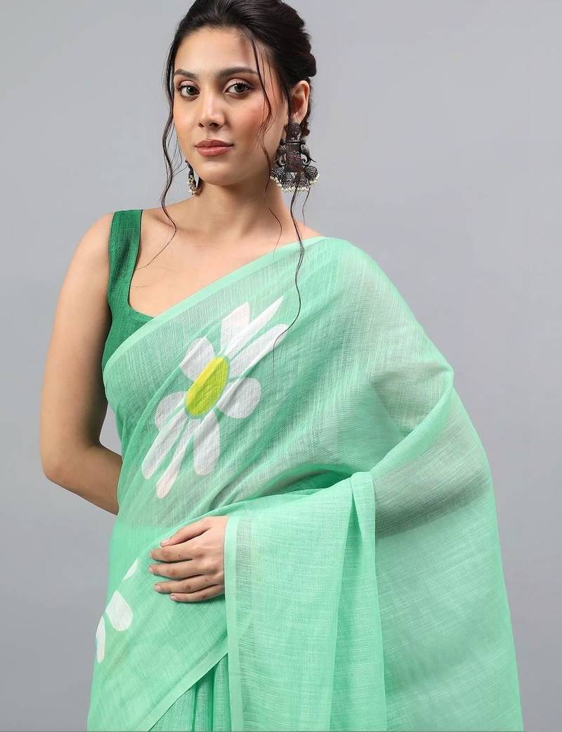 Sea green linen printed saree with blouse