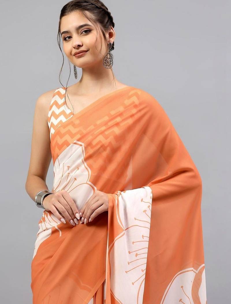 Orange georgette printed saree with blouse