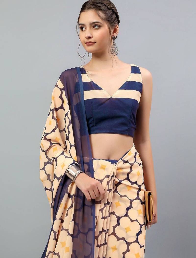 Peach georgette printed saree with blouse